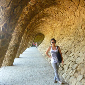Photo of Mariana standing under rock arches